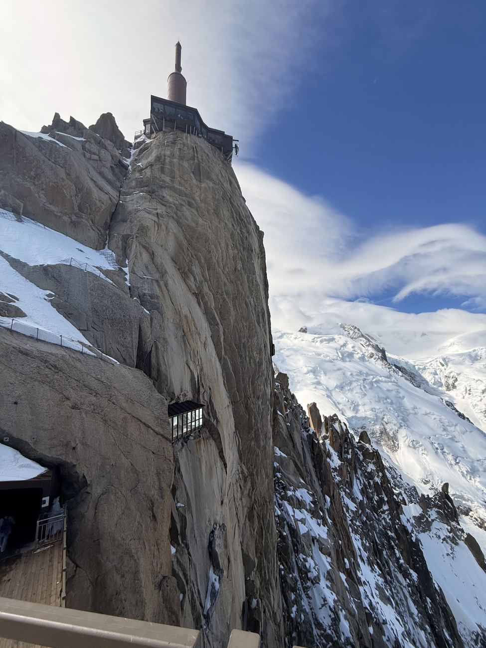 The Aiguille du Midi, snow-fresh granite against blue sky