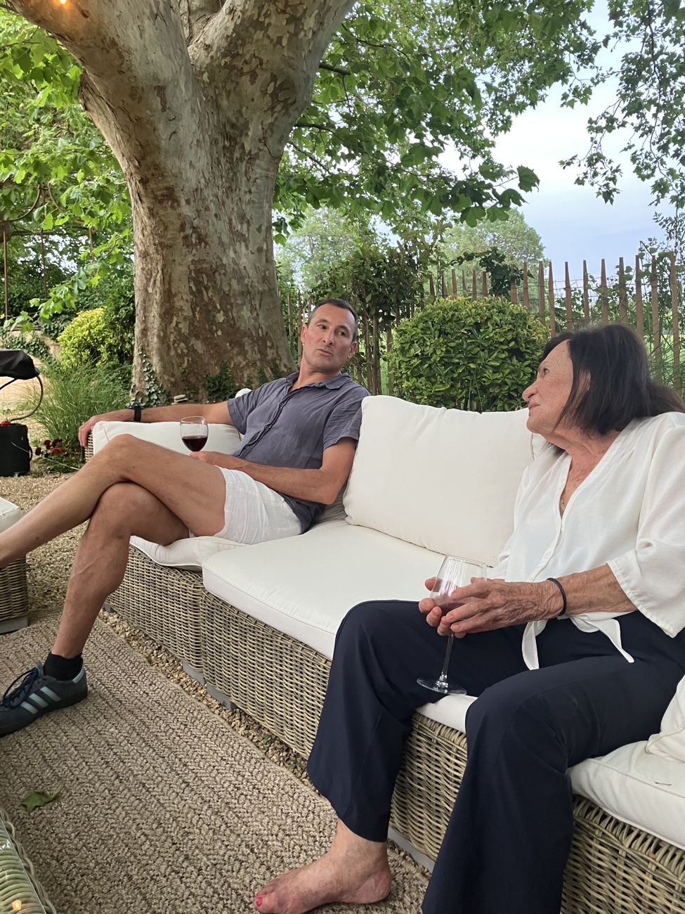 Holding court on the wicker sofa
