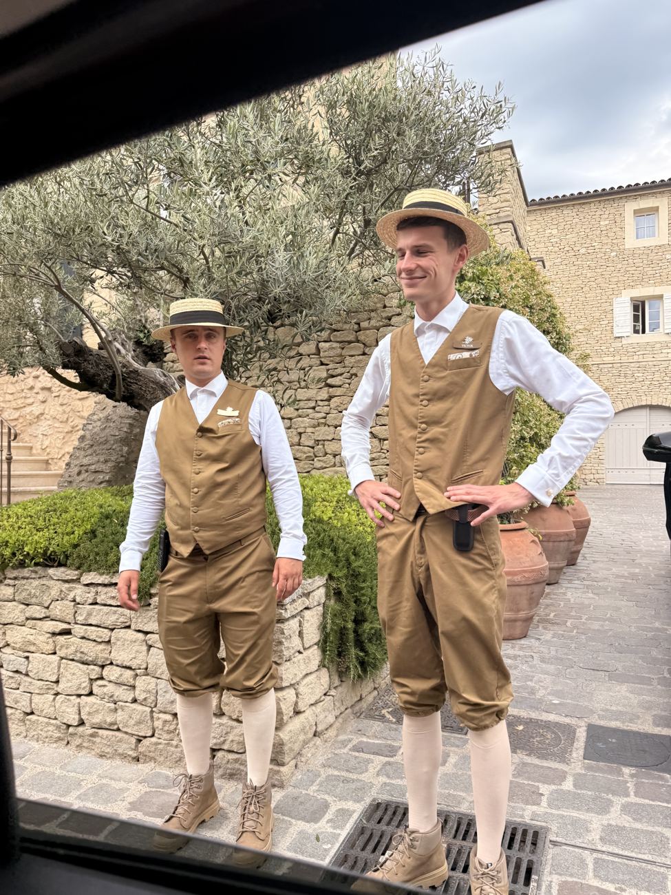 The bellhops, in costume