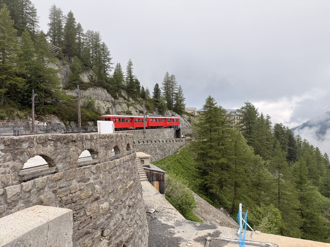 The red train on the viaduct