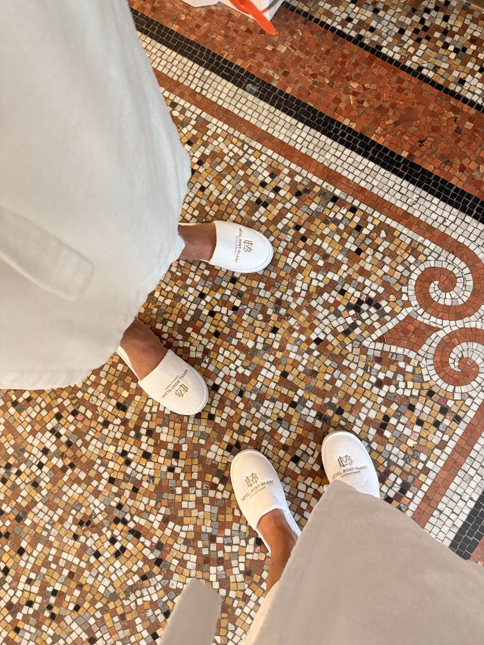 House slippers on mosaic