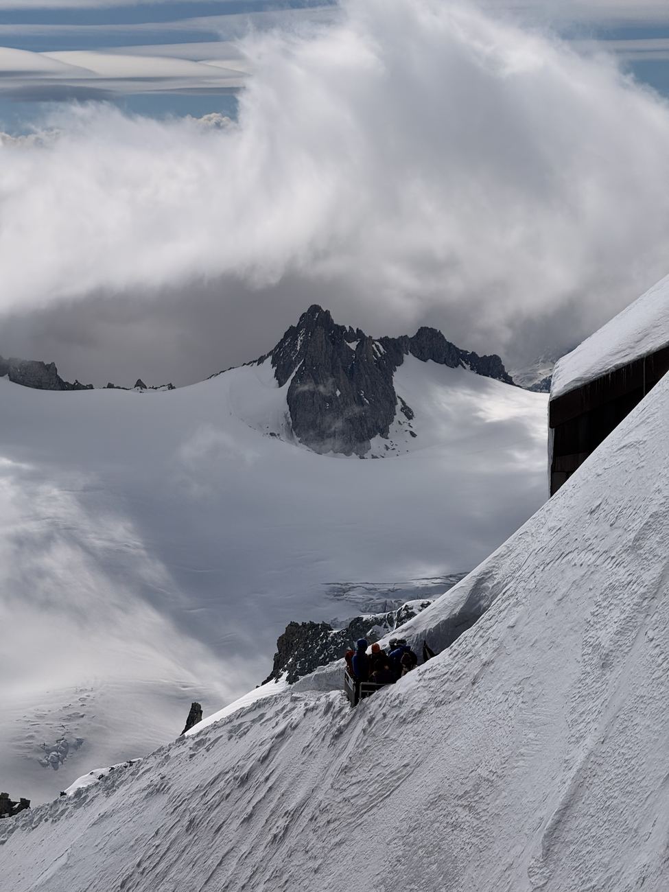 Cloud pouring over the ridge