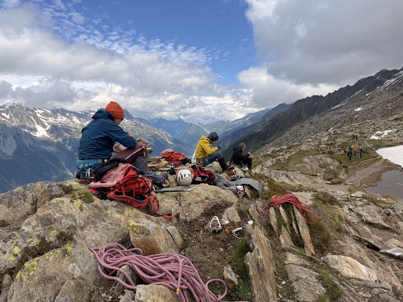 Climbers coiling ropes