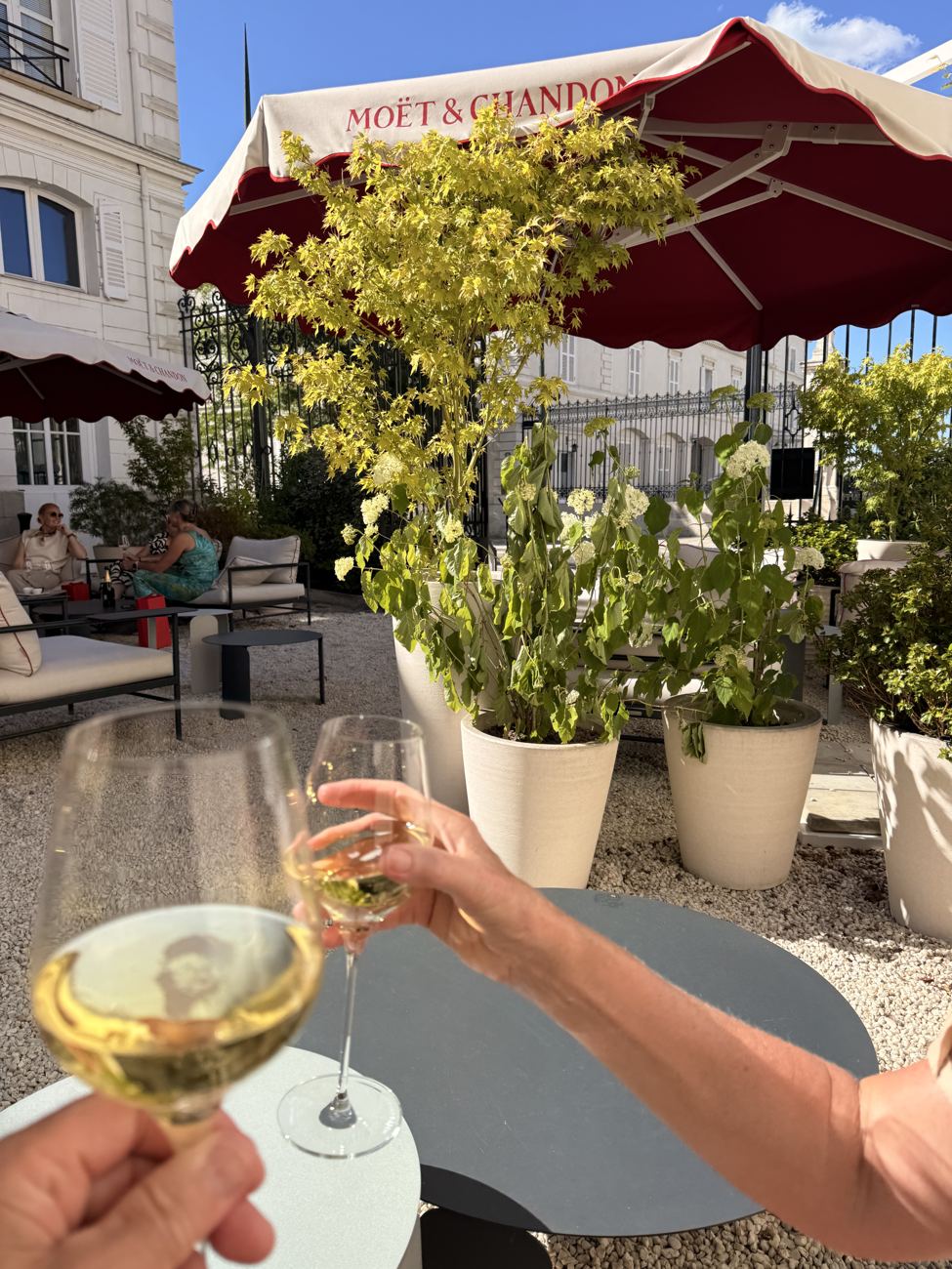 A toast under the Moët parasol